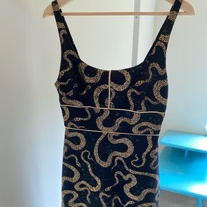 Black and Gold Ecoté Serpent Mini Dress